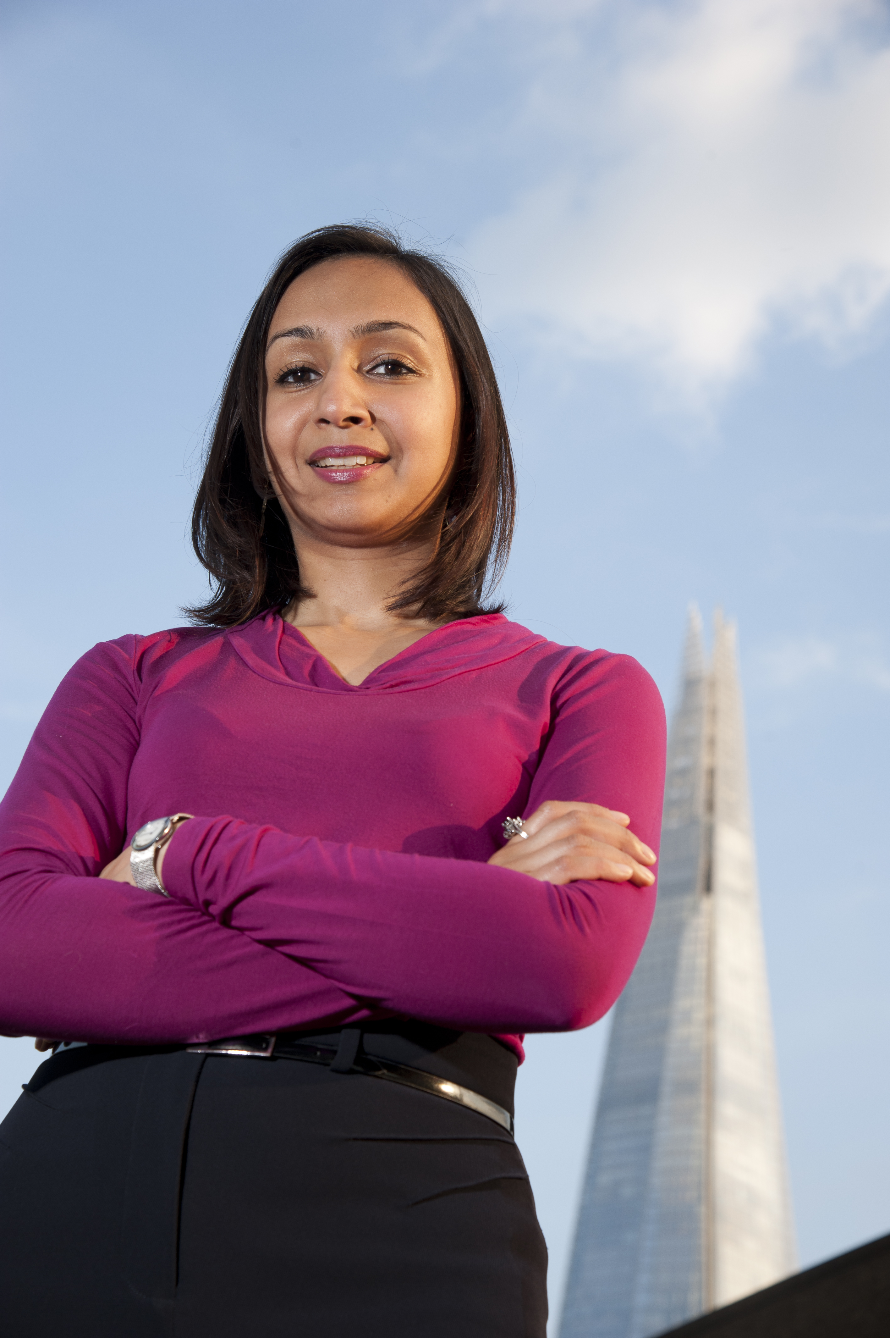 Photograph of Roma Agrawal standing in front of The Shard.